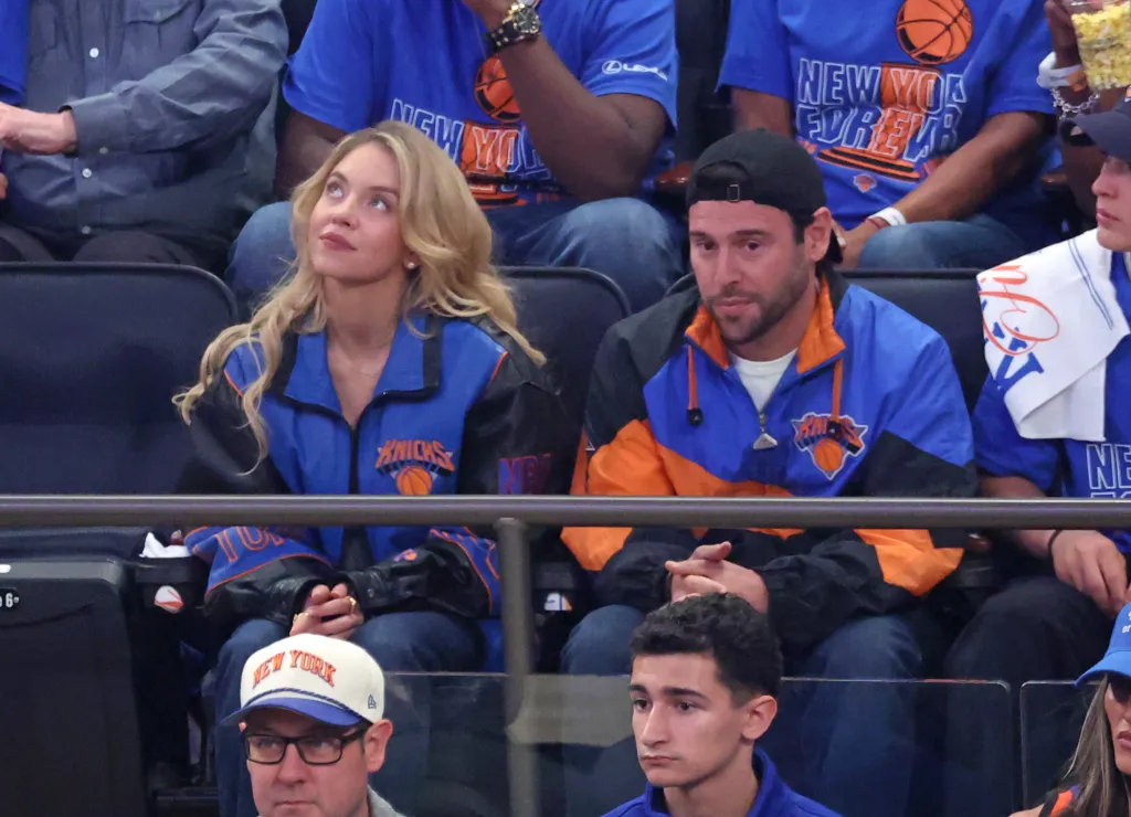 Actress Sydney Sweeney and Scooter Braun in the stands at Madison Square Garden.
