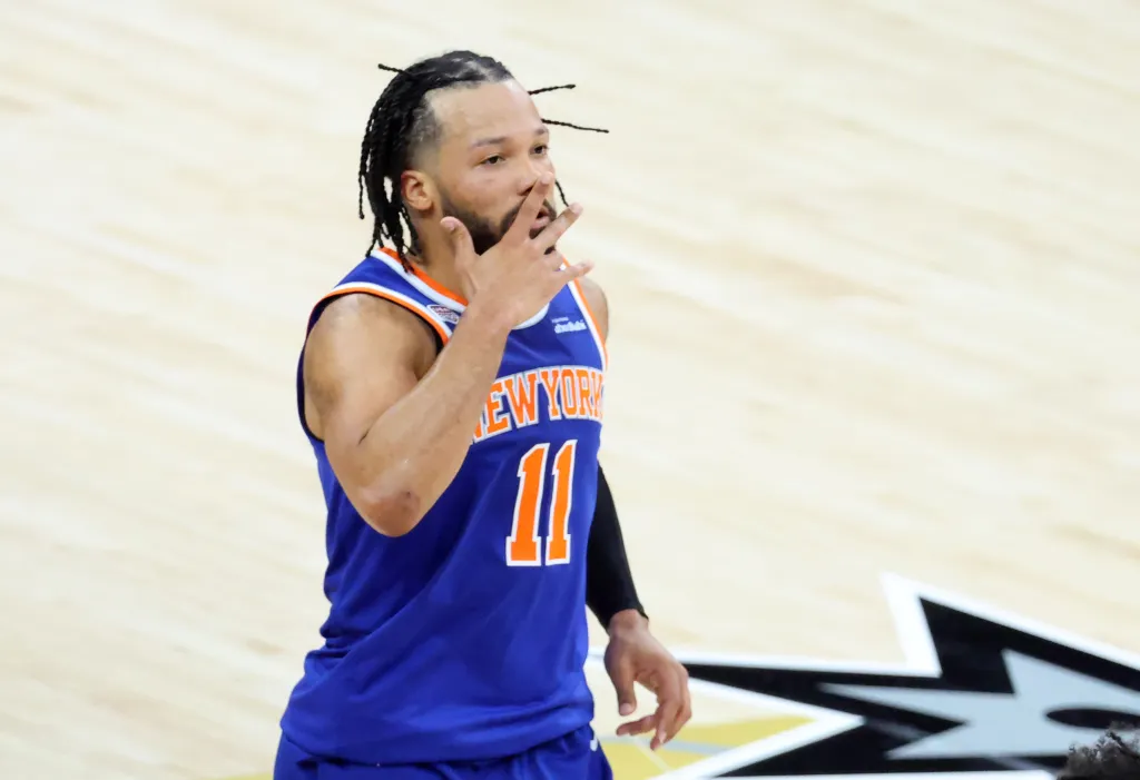 New York Knicks guard Jalen Brunson reacting after making a three-point shot.