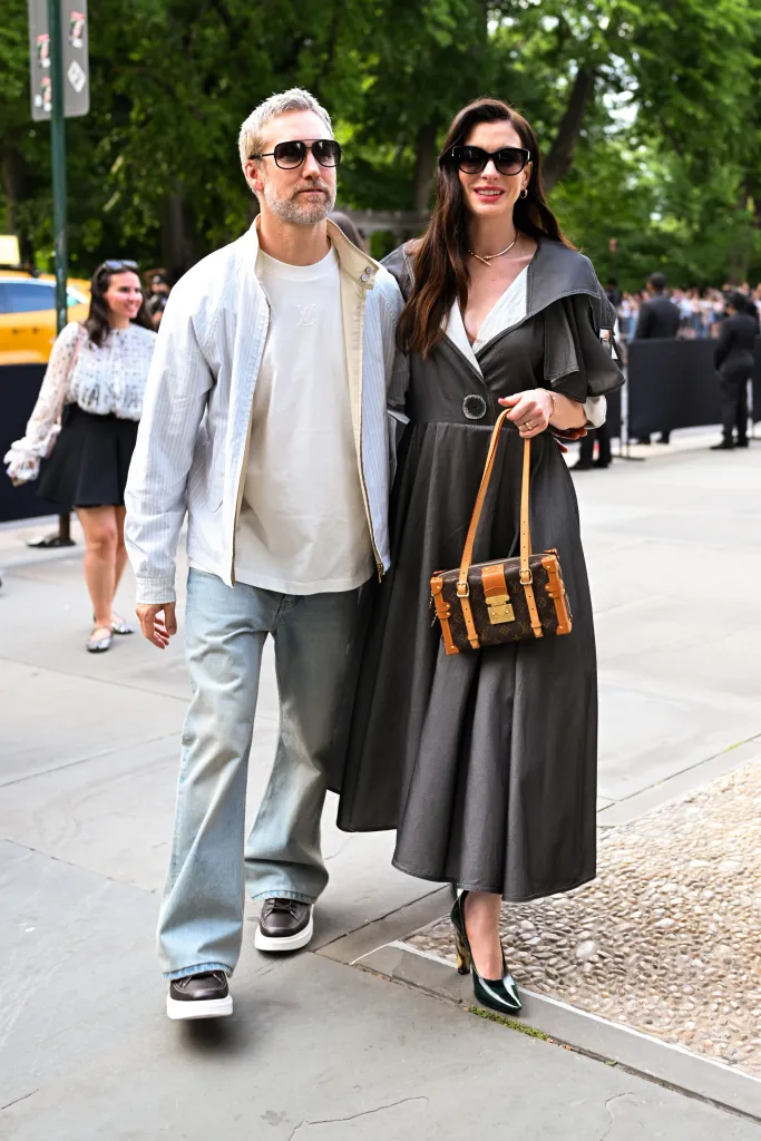Adam Shulman and Anne Hathaway at the Louis Vuitton Cruise Show.