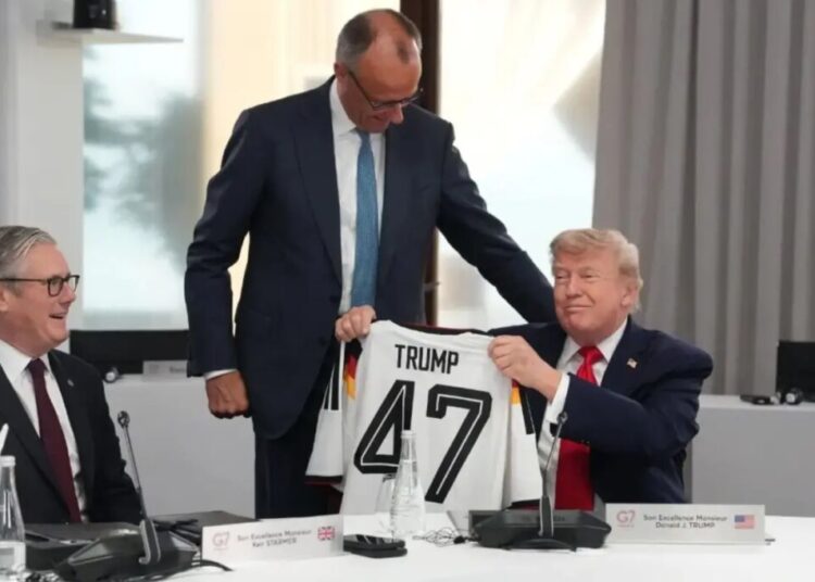 German Chancellor gives Trump a ‘TRUMP 47’ soccer jersey as belated birthday gift at G7 summit