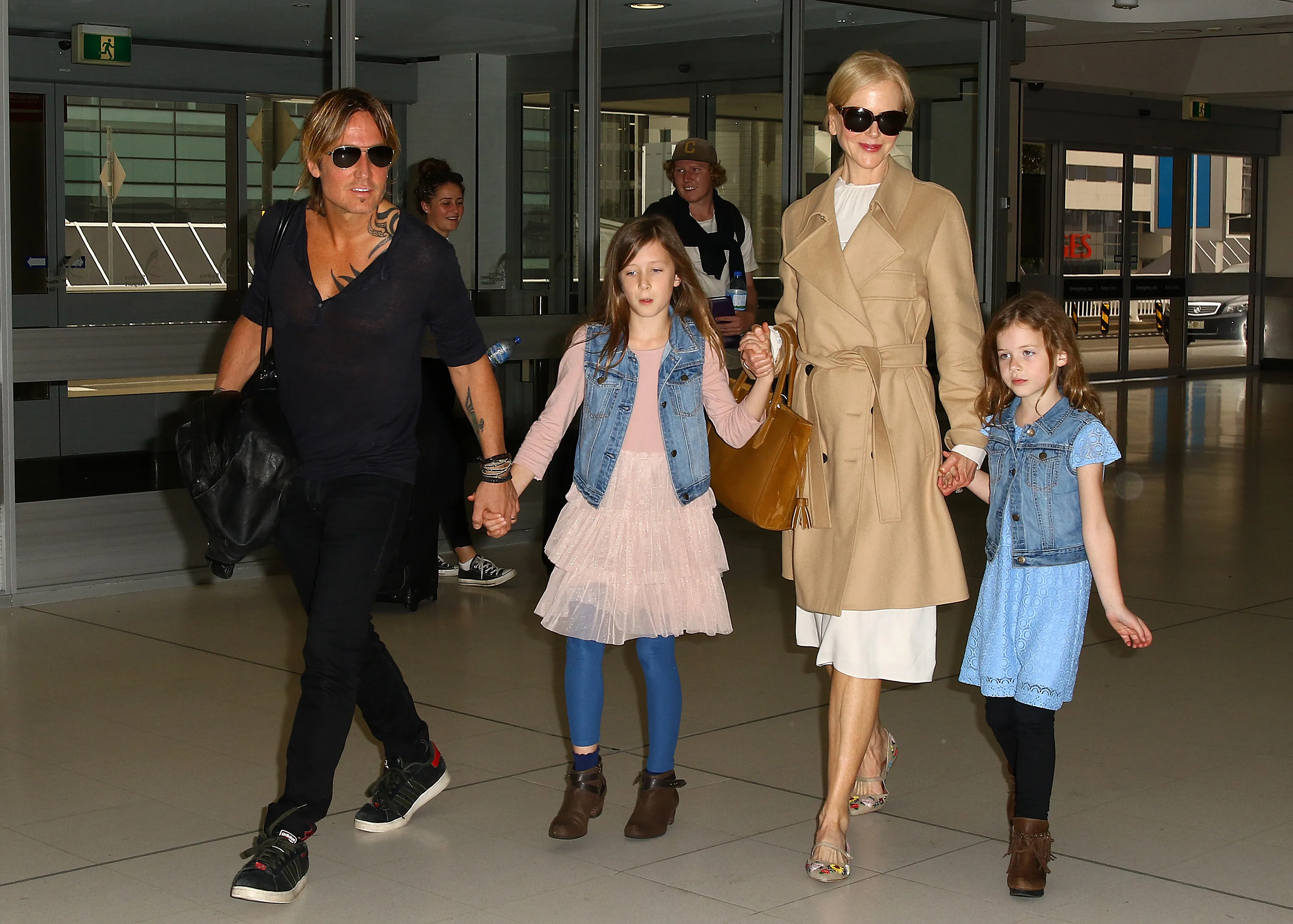 Nicole Kidman and Keith Urban arrive at Sydney airport with their daughters Faith Margaret and Sunday Rose.