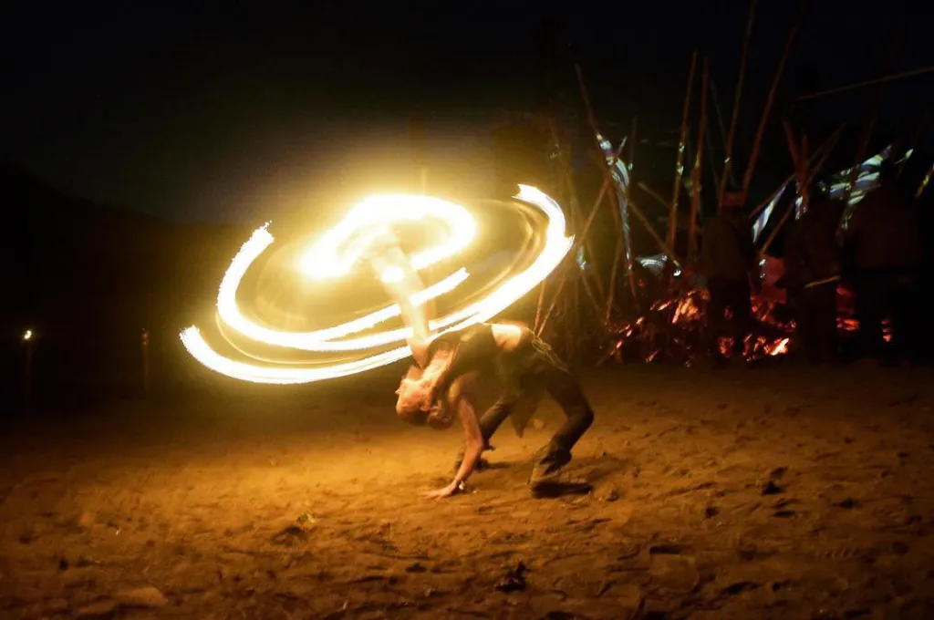 Nicole Najlis performing with fire.
