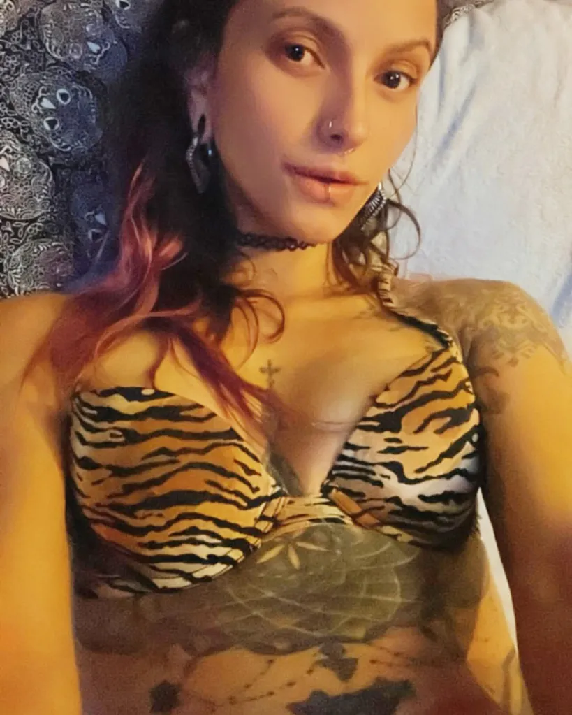 Nicole Najlis wearing a tiger print top.