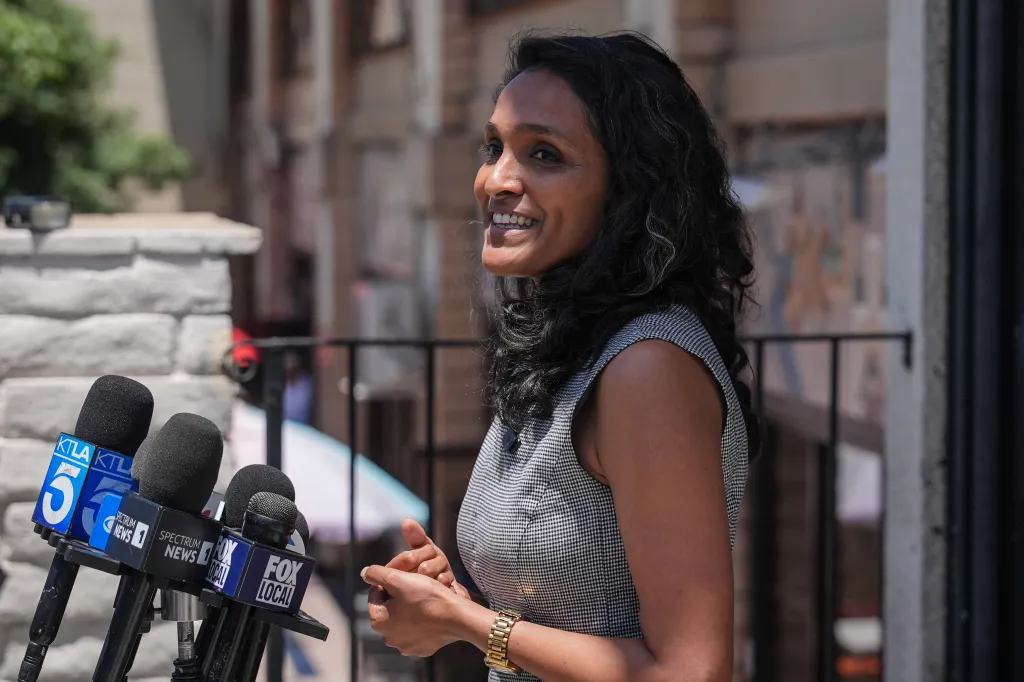 Los Angeles mayoral candidate Nithya Raman speaks to reporters after a campaign event.