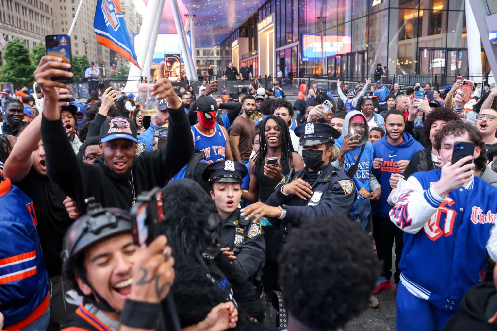 Fans at a New York Knicks watch party at Madison Square Garden.