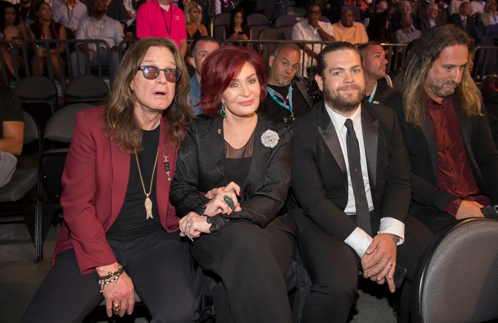 Ozzy, Sharon, and Jack Osbourne sit ringside at the T-Mobile Arena.