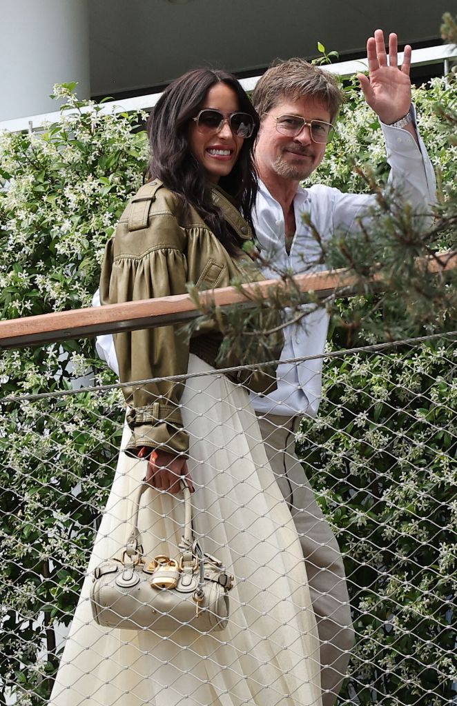Brad Pitt and Ines de Ramon attending the French Open.