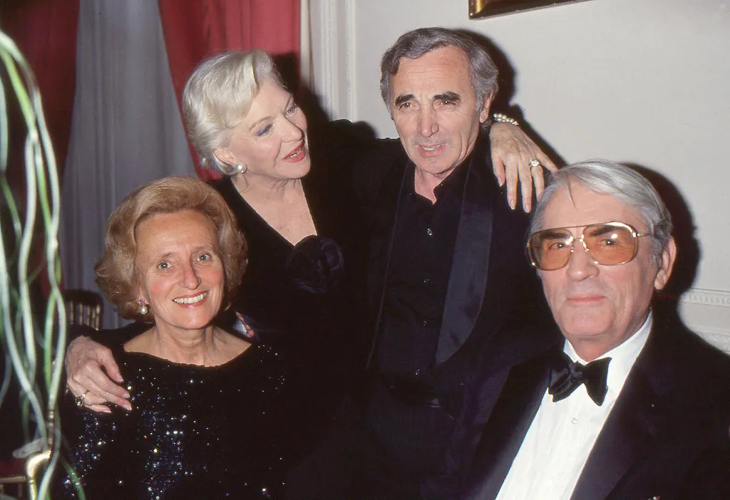 Bernadette Chirac with two women and a man.