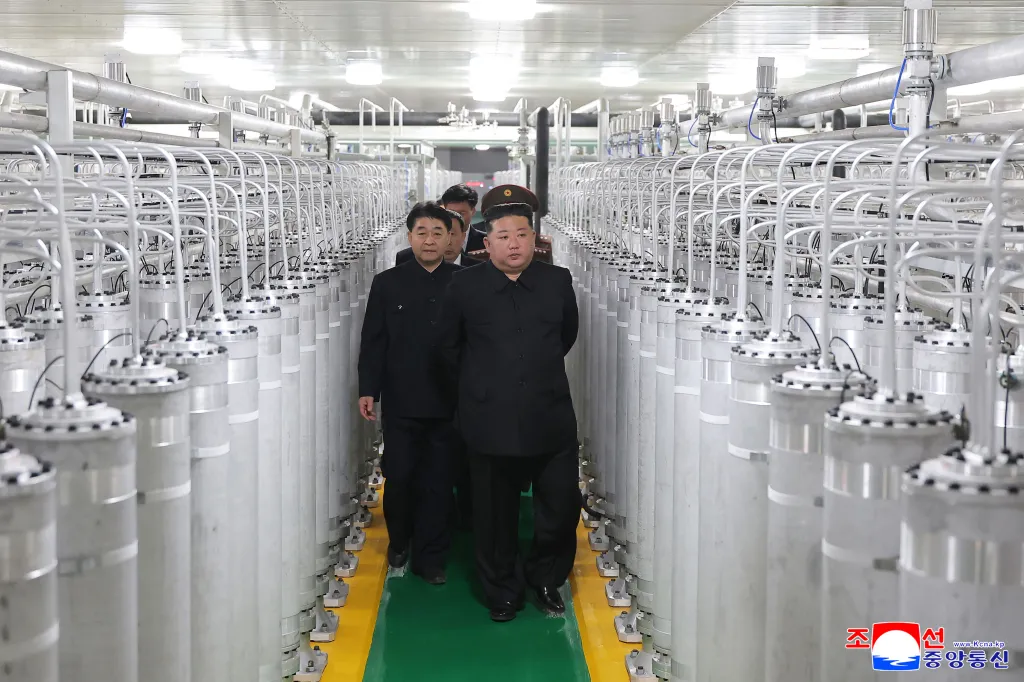 North Korean leader Kim Jong Un (front R) inspecting the newly-inaugurated nuclear materials production factory at an undisclosed location in North Korea.