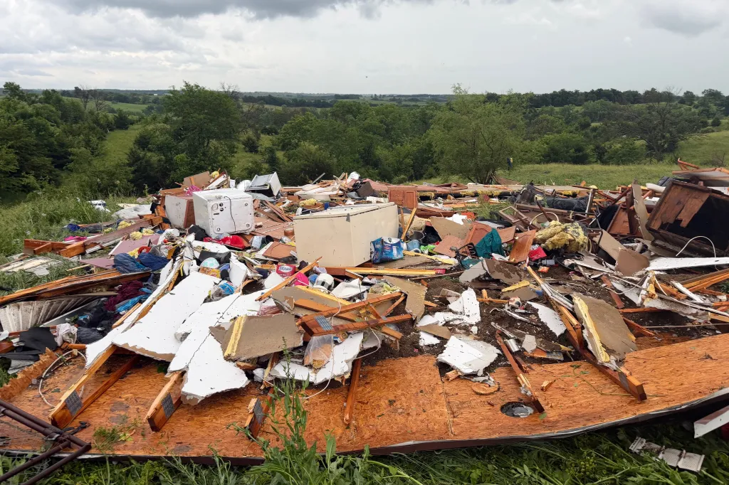the remnants of Shane and Jimmie Tipton's home in Unionville, Mo., Wednesday, June 10, 2026, after a tornado struck.
