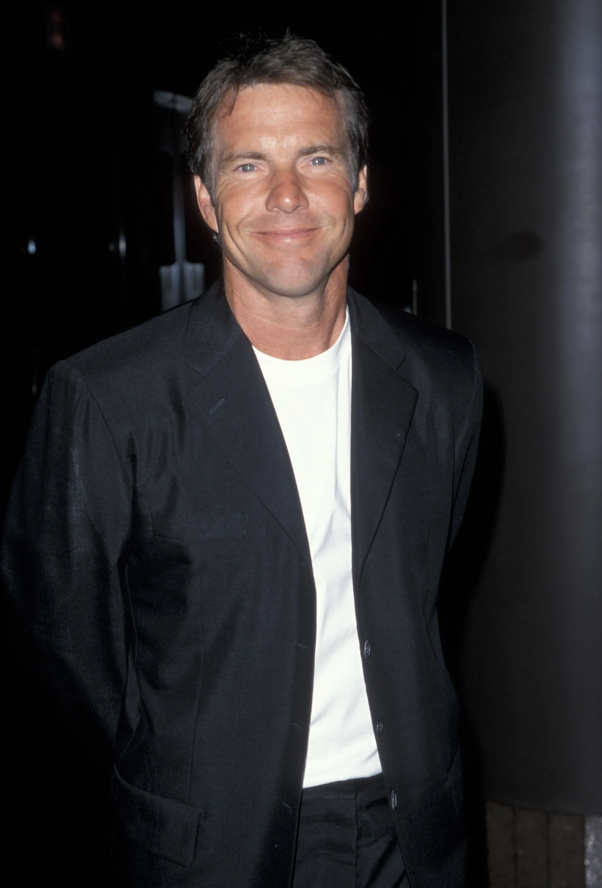 Dennis Quaid smiling at the premiere of 