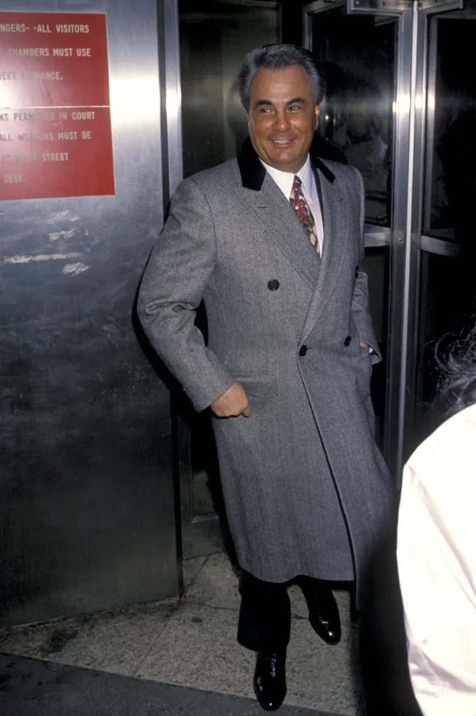 John Gotti smiling at the New York Federal Courthouse.
