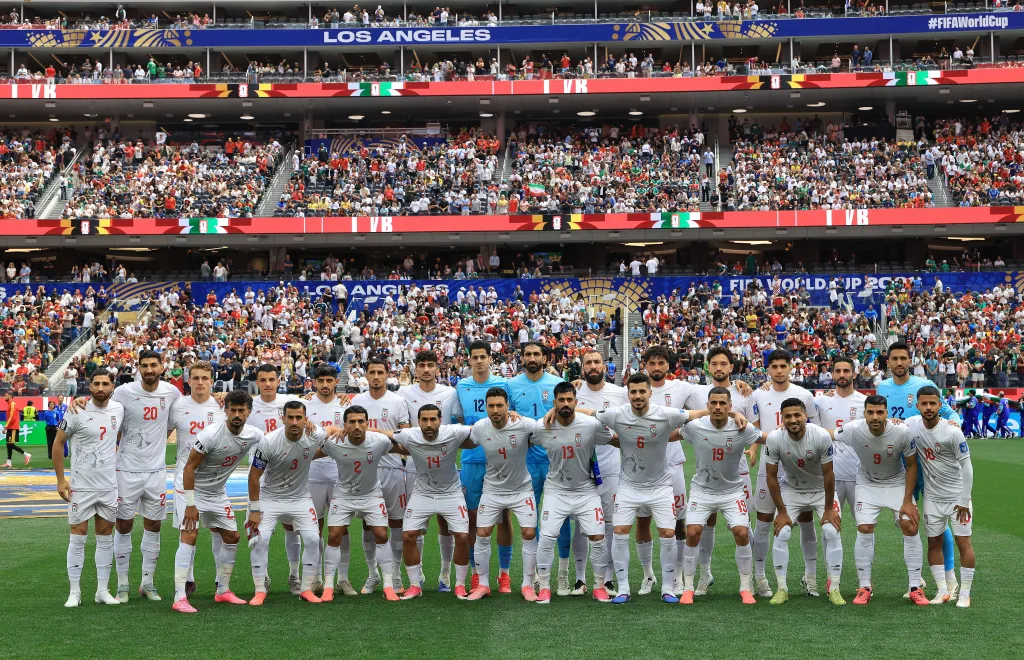 Players of Iran pose for photos before a group G match against Belgium at the 2026 FIFA World Cup in Los Angeles.
