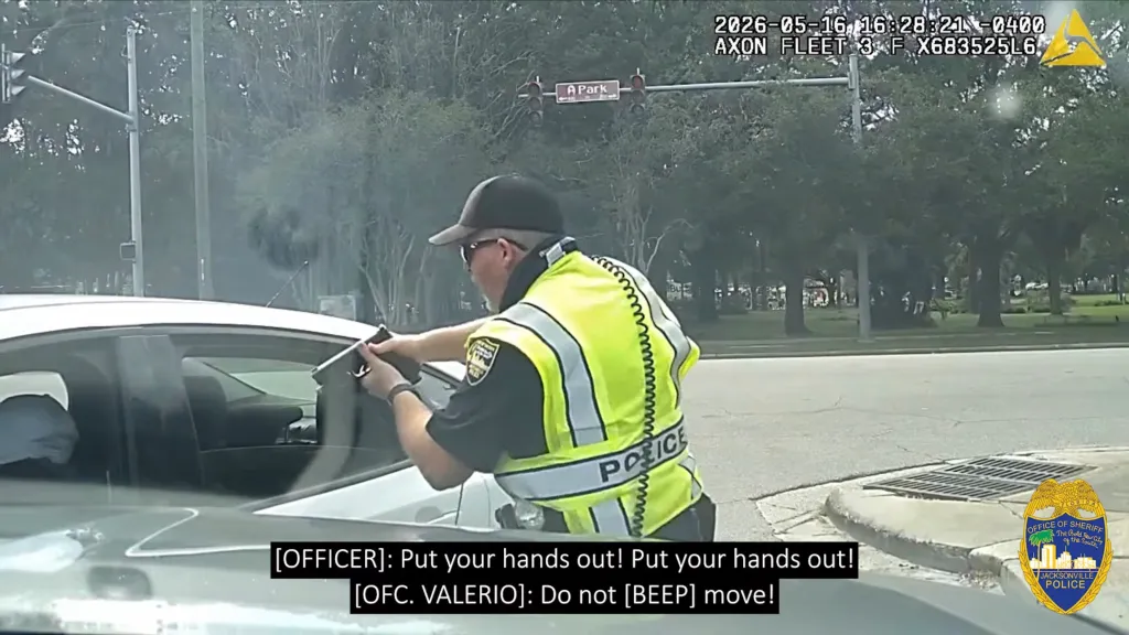 Valerio raced up to Simon's car and performed a PIT maneuver, wiping out the wanted car as multiple officers rushed to the vehicle and trained their weapons on the driver.