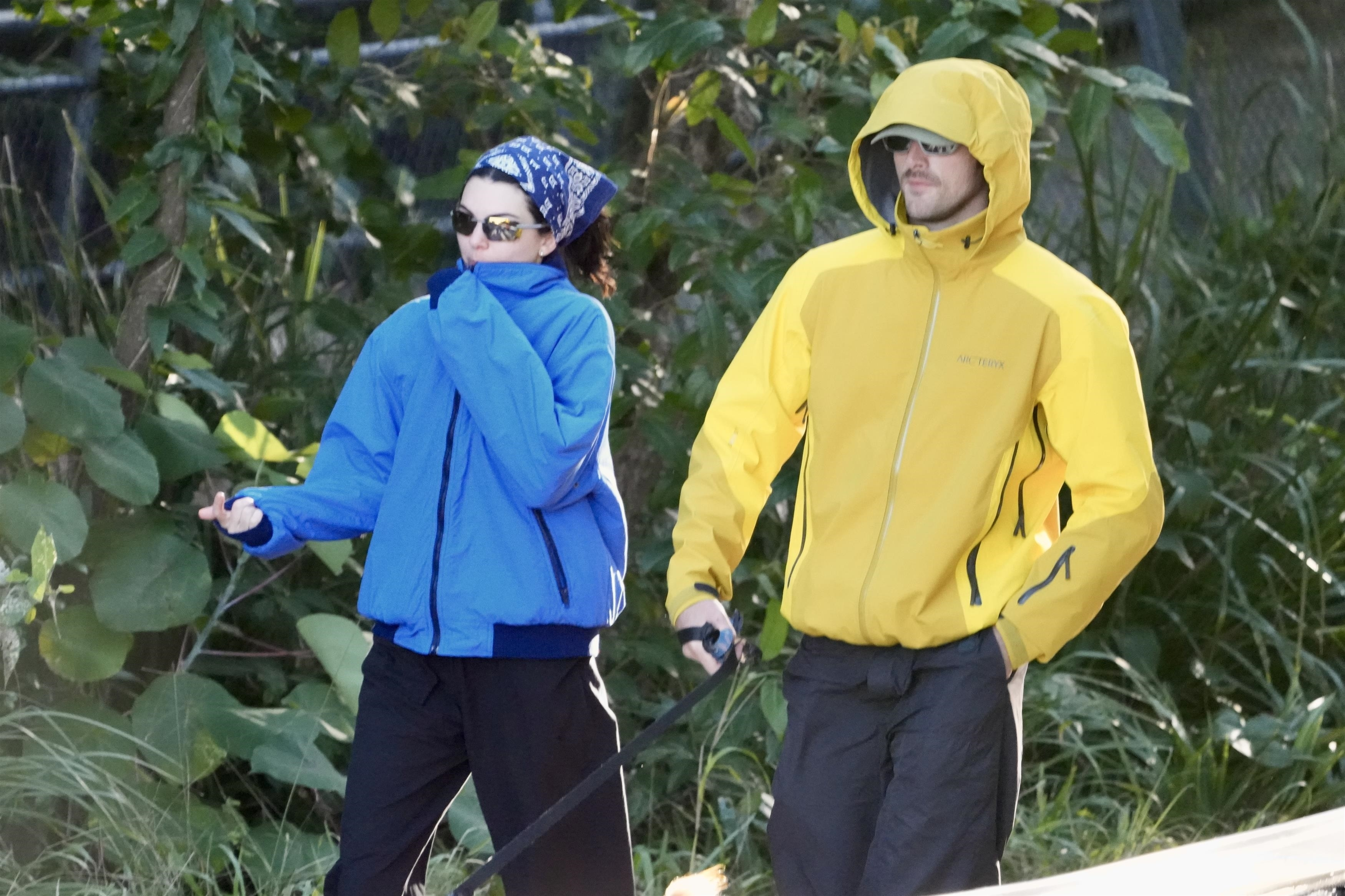 Jacob Elordi and Kendall Jenner walking a dog.