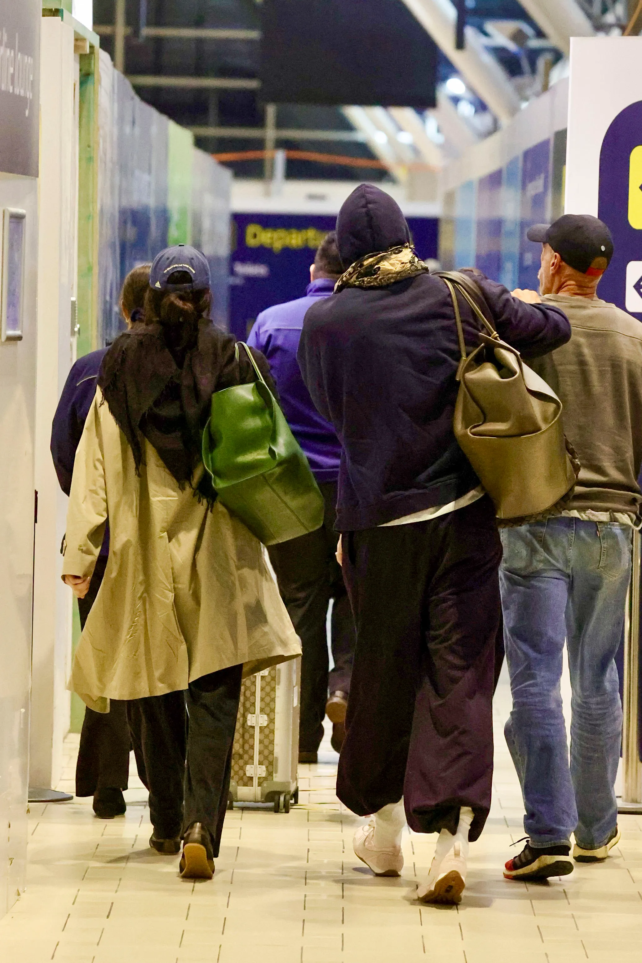 Kendall Jenner and Jacob Elordi walking through Brisbane Airport.