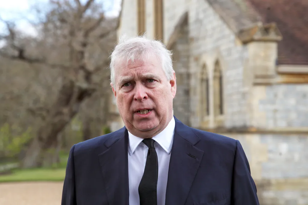 Prince Andrew, Duke of York, speaks to the camera in front of the Royal Chapel of All Saints.