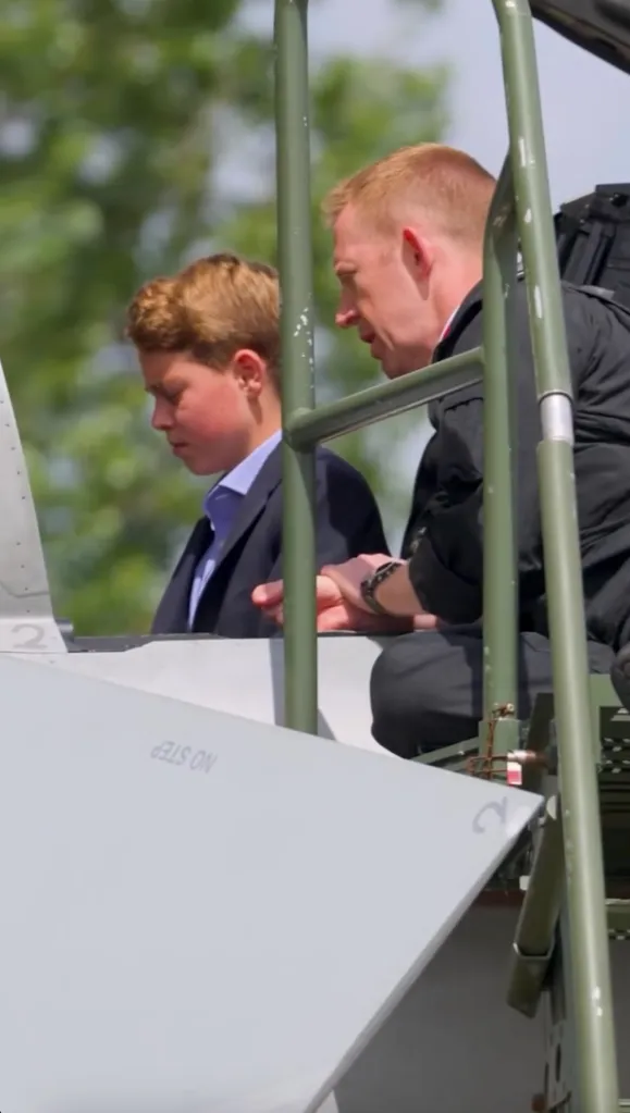 Prince George with an RAF officer at RAF Coningsby.
