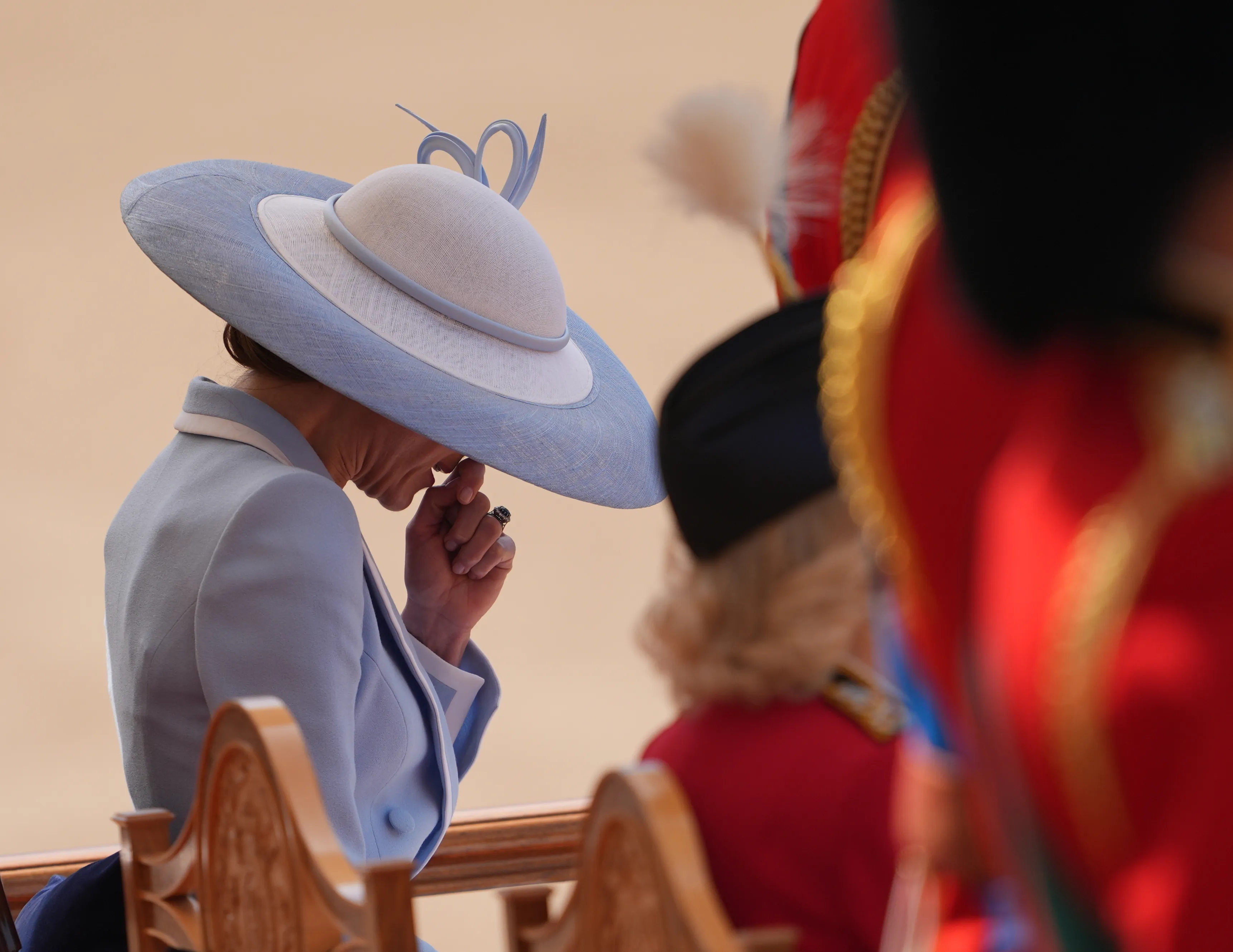 The Princess of Wales sneezes during the Trooping the Colour ceremony.