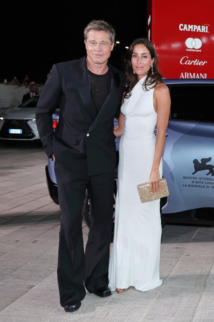 Brad Pitt and Ines de Ramon on the red carpet at the 81st Venice International Film Festival.