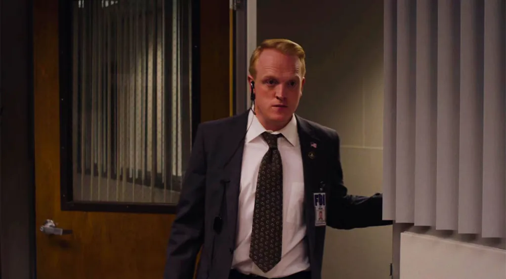 Owain Rhys Davies as an FBI agent in 