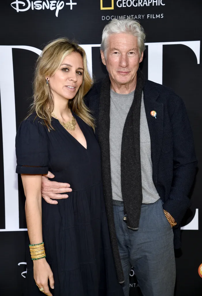 Richard Gere and Alejandra Silva pose for a photo.