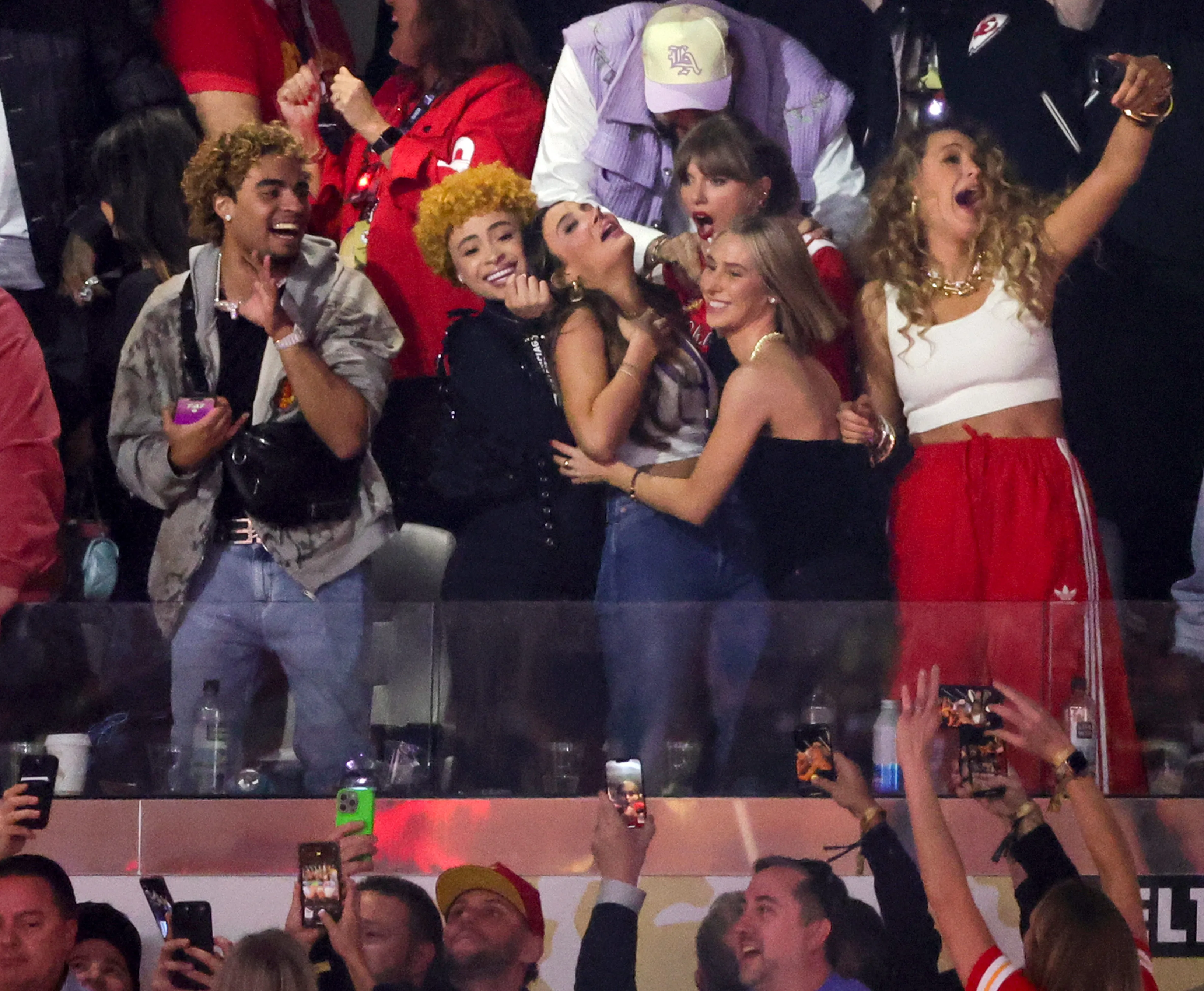 (L-R) RIOTUSA, Ice Spice, Keleigh Teller, Taylor Swift, Ashley Avignone and Blake Lively celebrate after the Kansas City Chiefs defeated the San Francisco 49ers 25-22 in overtime of Super Bowl LVIII at Allegiant Stadium on February 11, 2024 in Las Vegas, Nevada.