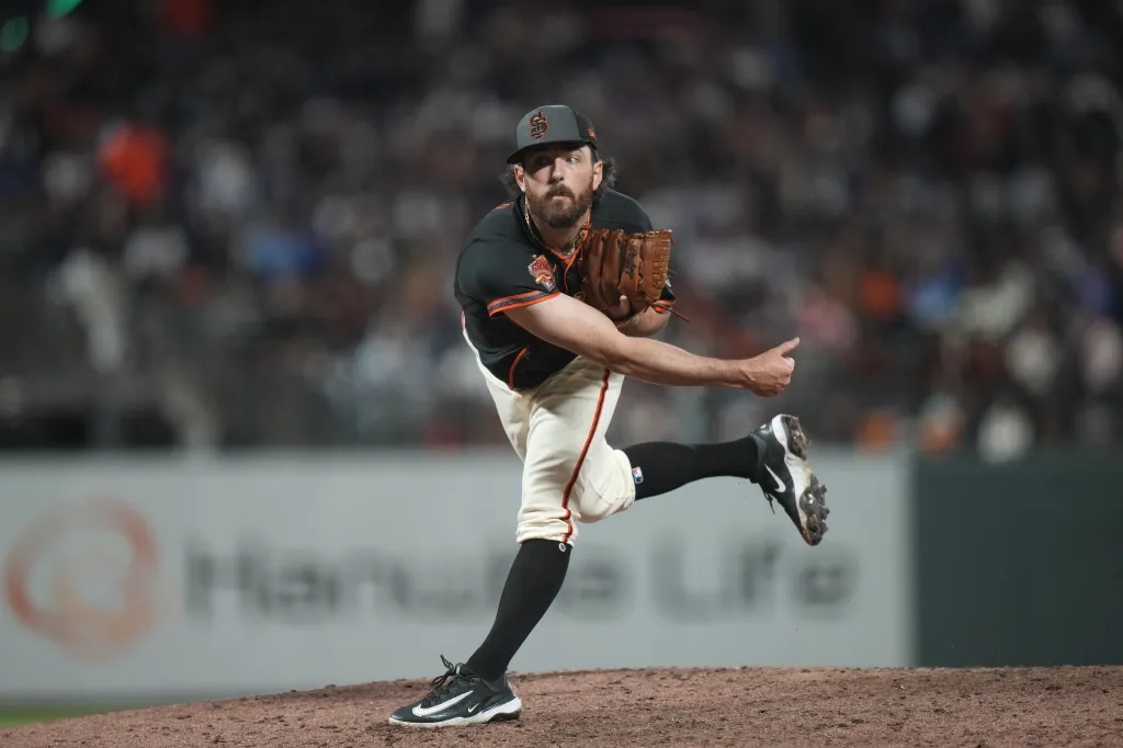 Ryan Walker, San Francisco Giants pitcher, throwing a pitch.