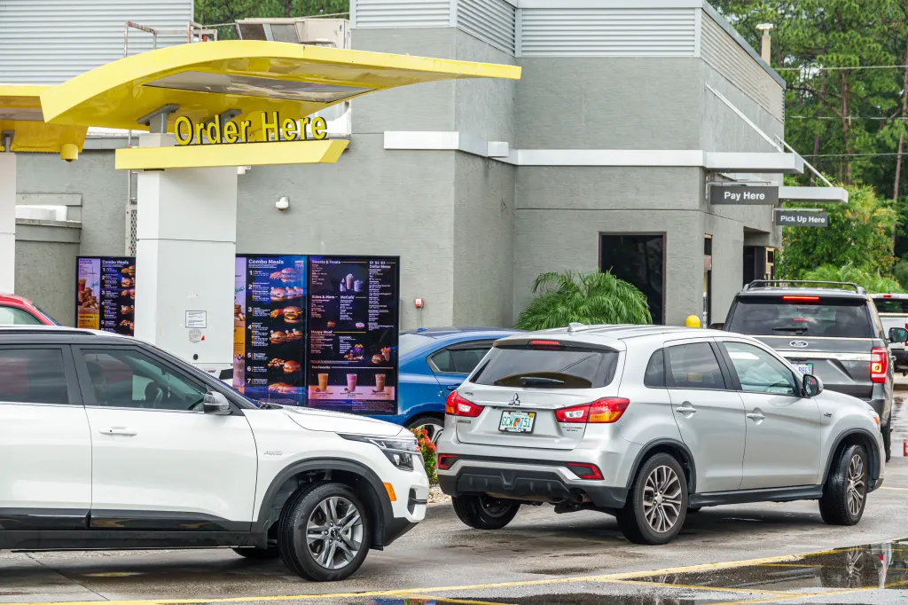 Cars in a McDonald's drive-thru line at the 