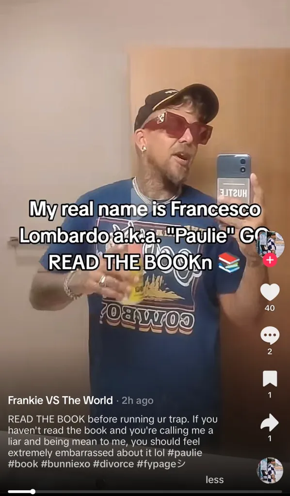 A man with a beard, sunglasses, and a cap filming himself in a mirror, with text overlay 