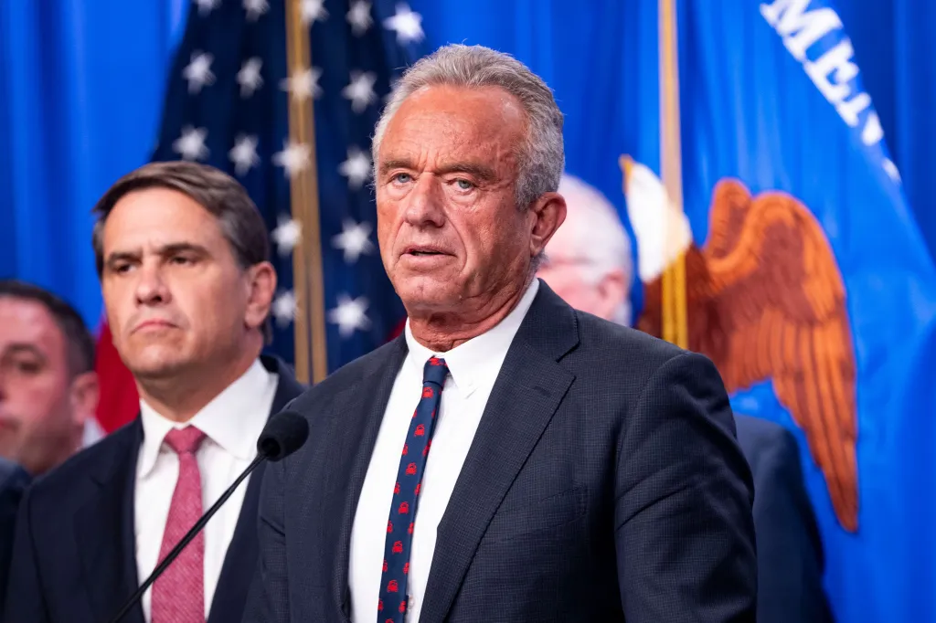 Robert F. Kennedy Jr. speaking at a press conference on healthcare fraud at the Department of Justice Headquarters.