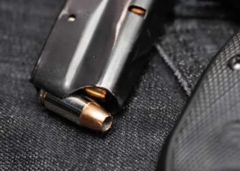 Influencer couple says death threats over abortion drove them to keep a gun by their bed