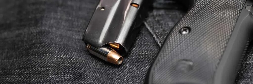 Influencer couple says death threats over abortion drove them to keep a gun by their bed