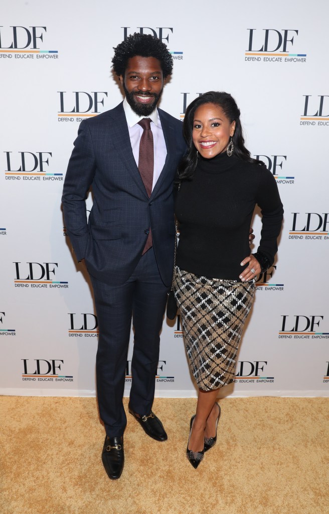 Sheinelle Jones, in a black sweater and plaid skirt, and Uche Ojeh, in a black suit, red tie and white shirt, attending the NAACP LDF 33rd National Equal Justice Awards Dinner.