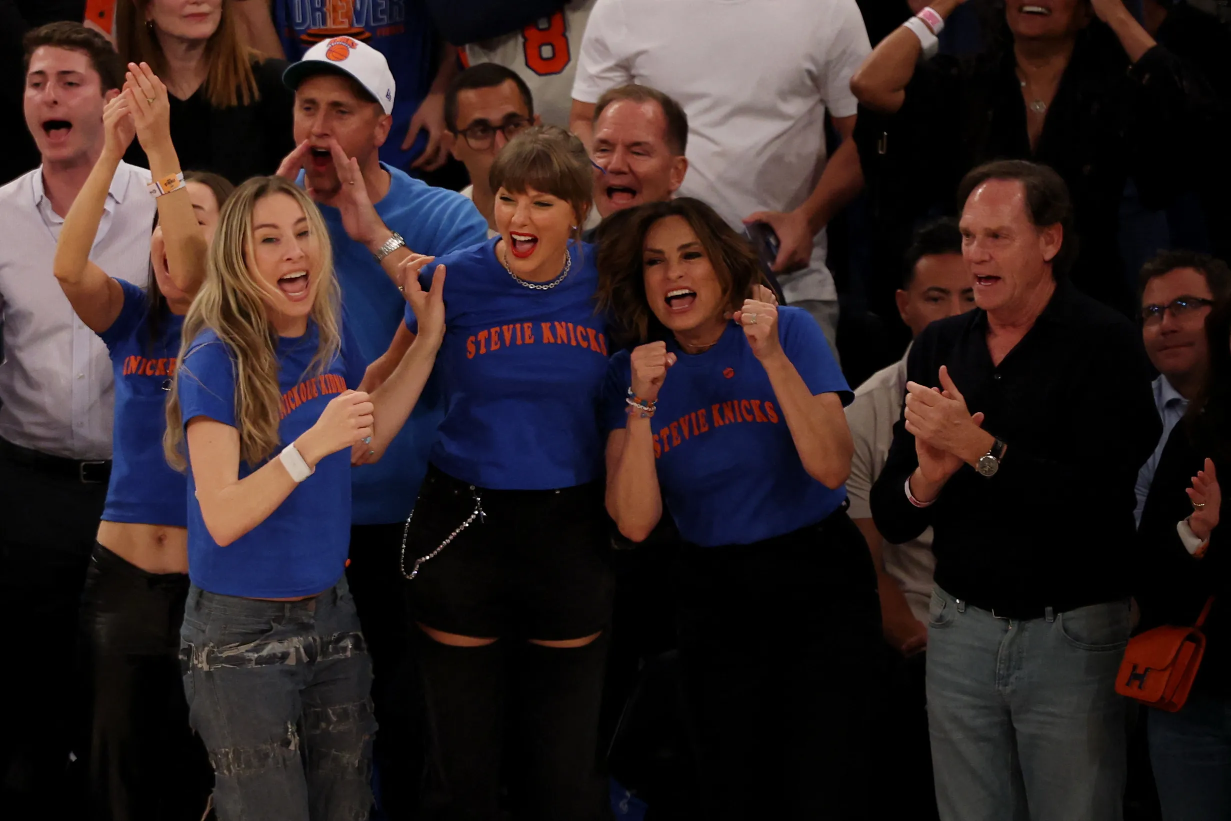 Taylor Swift, Mariska Hargitay, and the Haim sisters cheer courtside at an NBA Finals game.