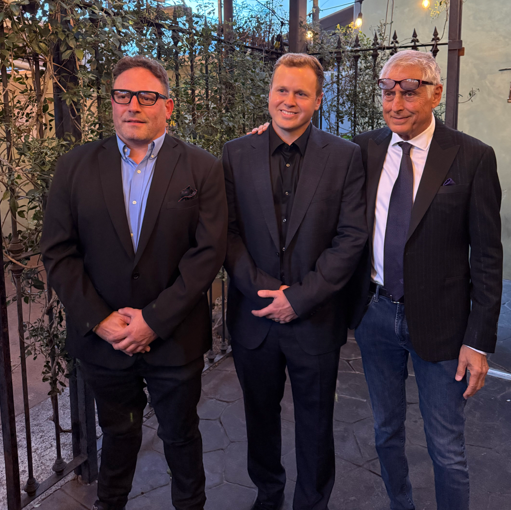 Spencer Pratt and two men pose for a photo at his election night event.