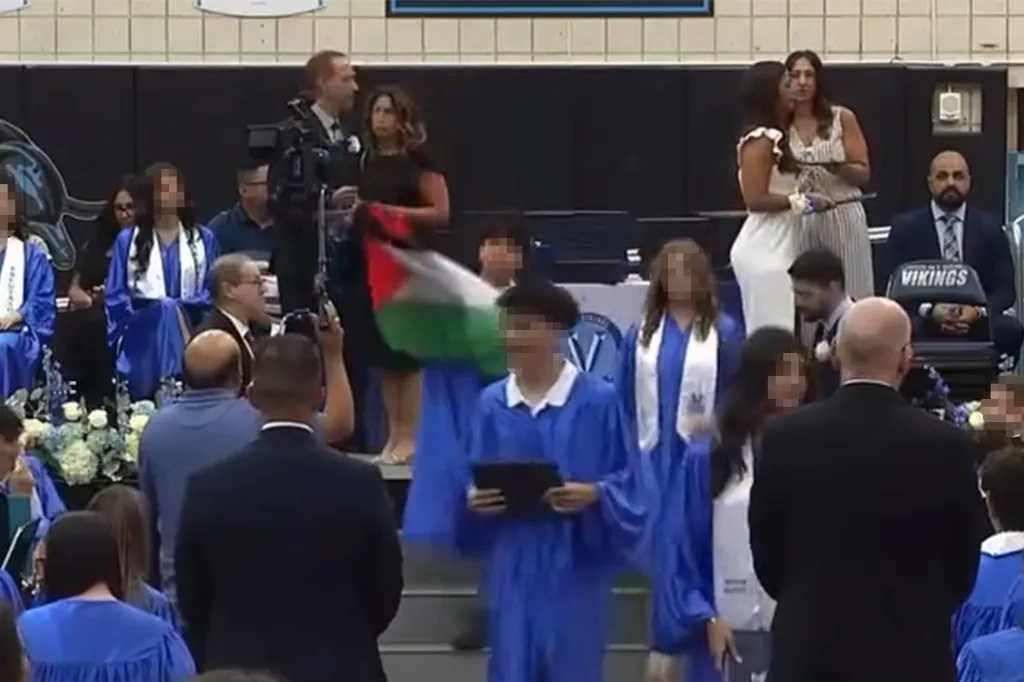 Staten Island middle schooler waves a Palestinian flag during a graduation ceremony at Elias Bernstein Intermediate School 7 