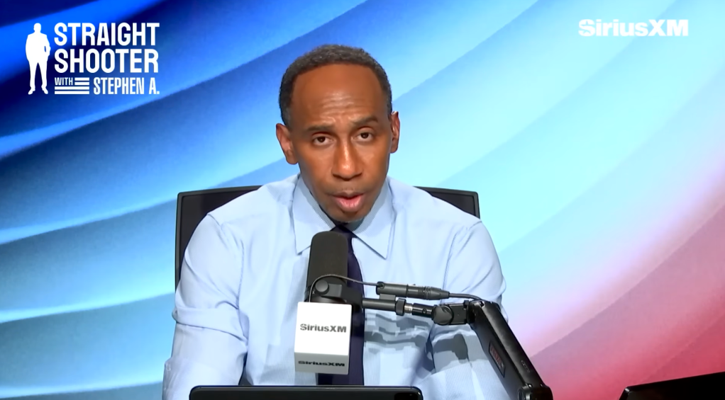 Stephen A. Smith speaking into a SiriusXM microphone.