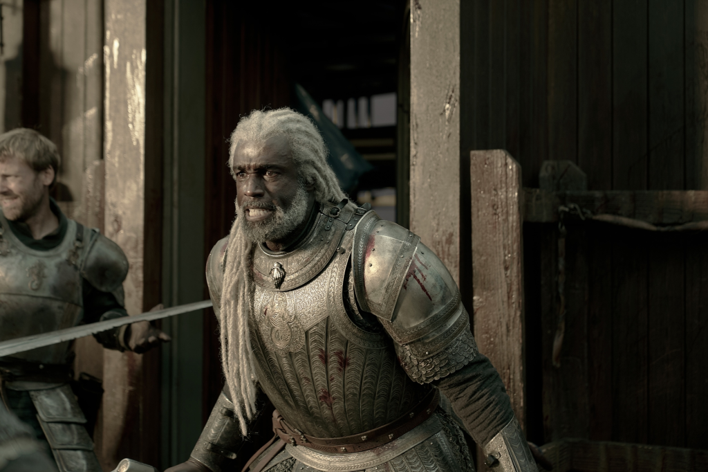 Steve Toussaint as Corlys Velaryon in full armor.
