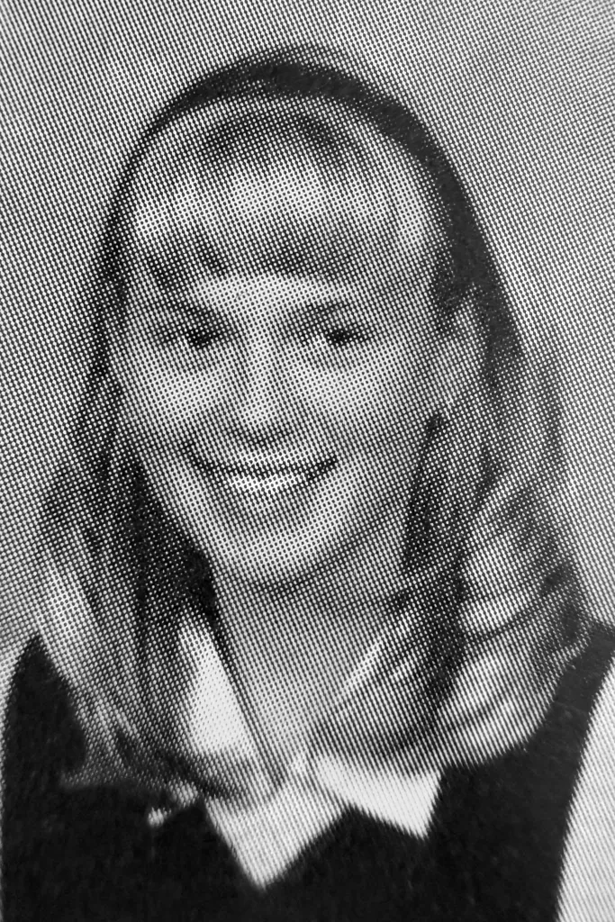 A solo school photo of Helphenstein is seen. It is in black and white.