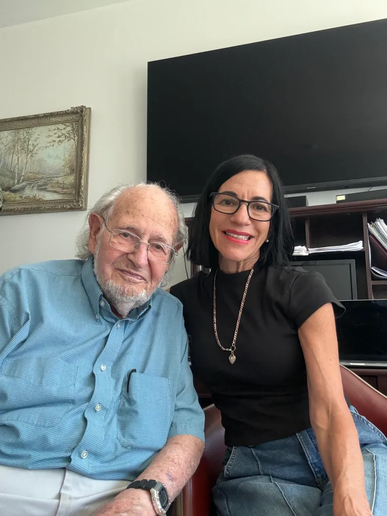 Sol Rosenblatt, 96, sits next to his matchmaker Brigitte Weil.