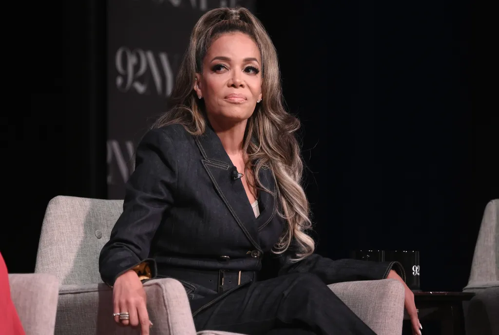 Sunny Hostin seated at a discussion for The View's