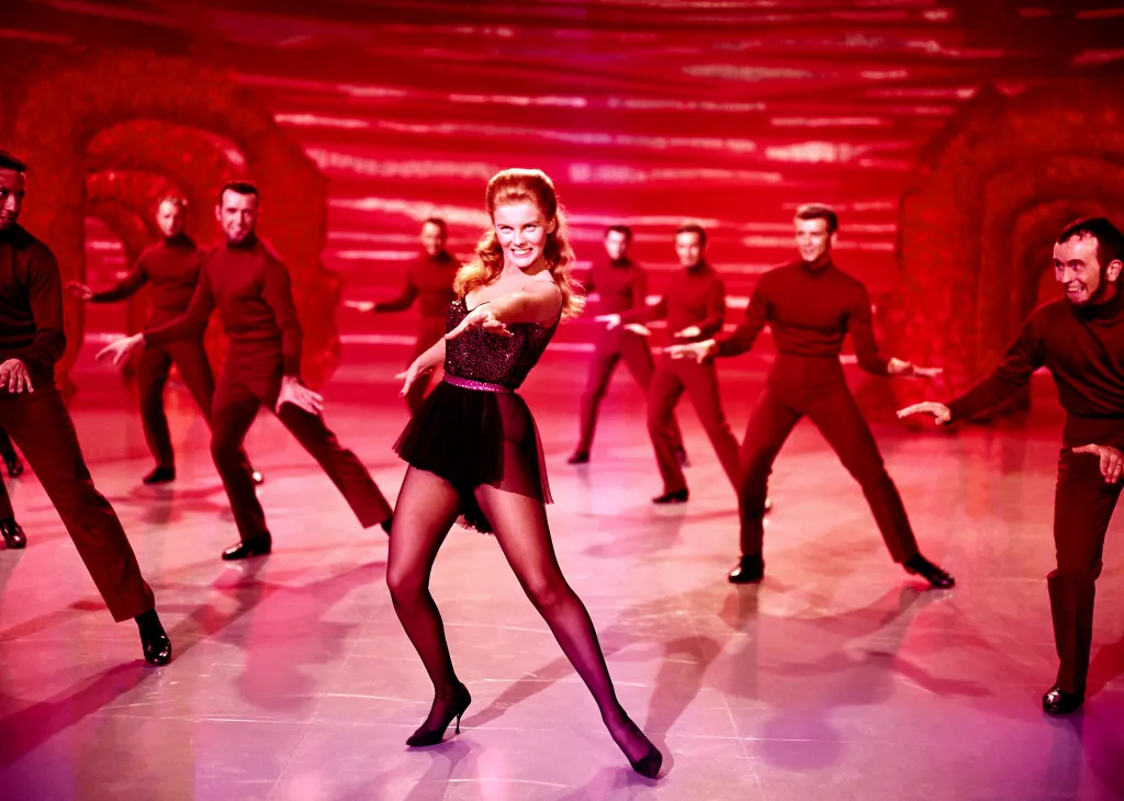 Ann-Margret singing and dancing with backup dancers on the set of the film State Fair.