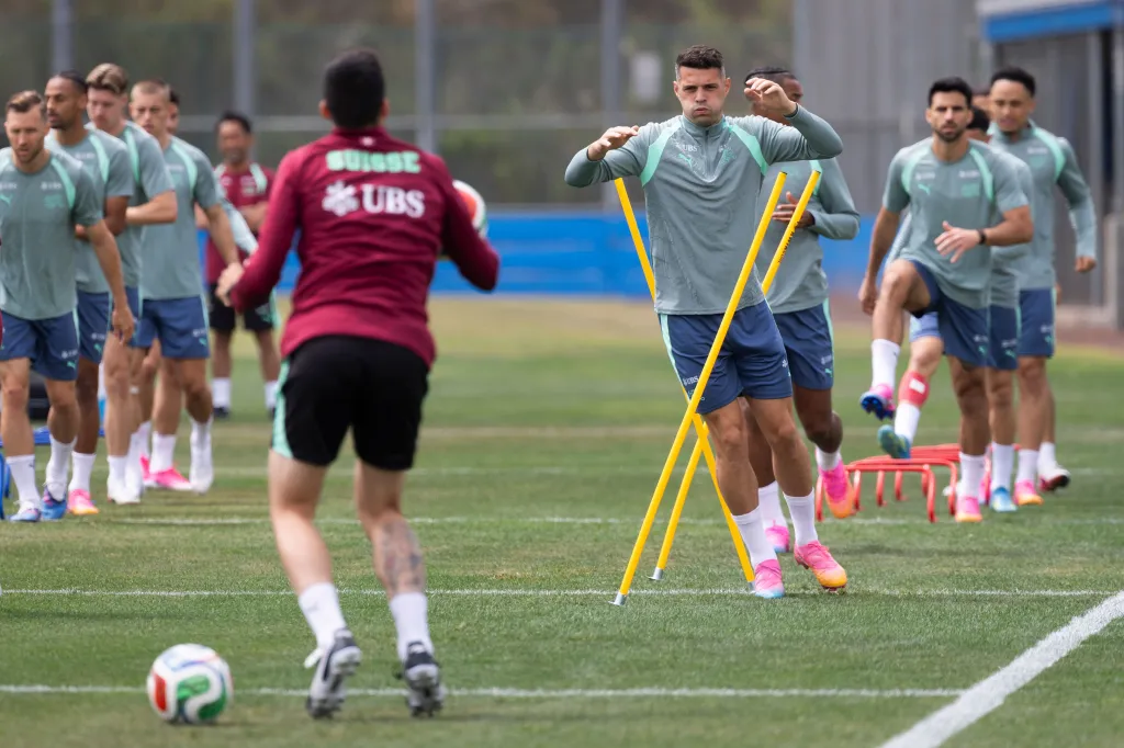 Switzerland's Granit Xhaka warms up during a training session.