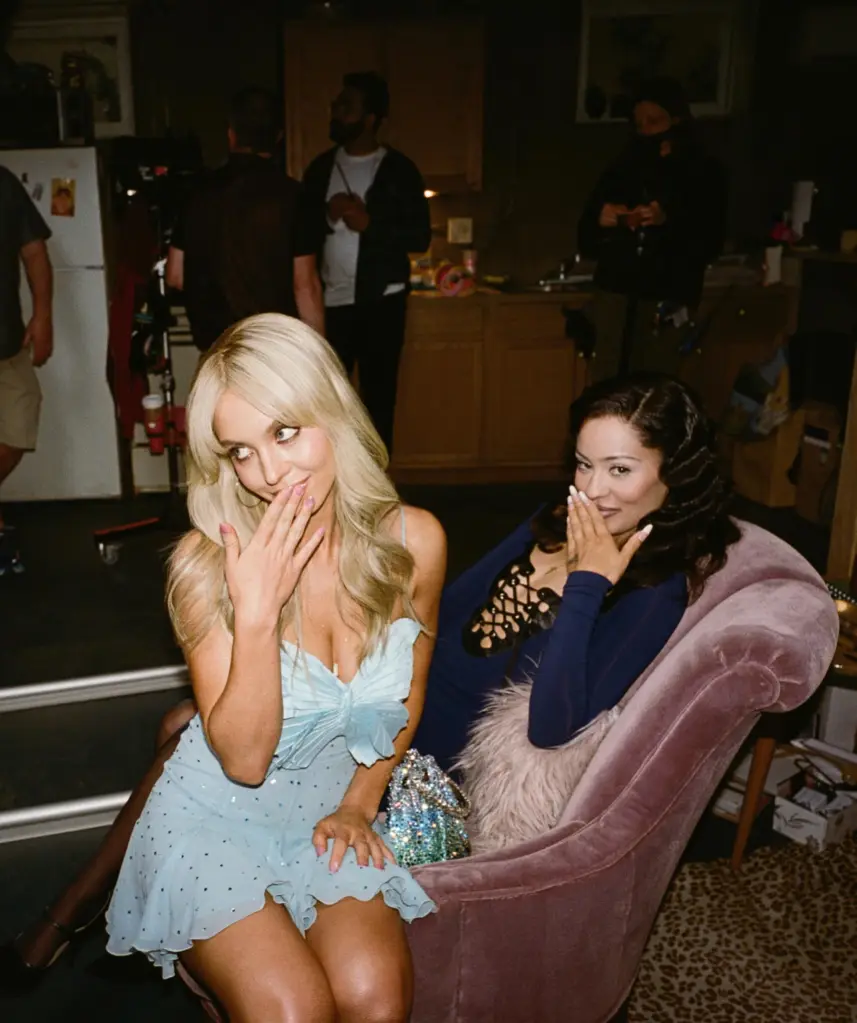 Sydney Sweeney and a co-star laughing behind the scenes of Euphoria.