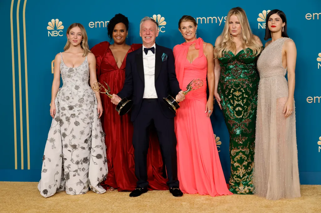 Sydney Sweeney, Natasha Rothwell, Mike White, Connie Britton, Jennifer Coolidge, and Alexandra Daddario pose with their Emmys for 