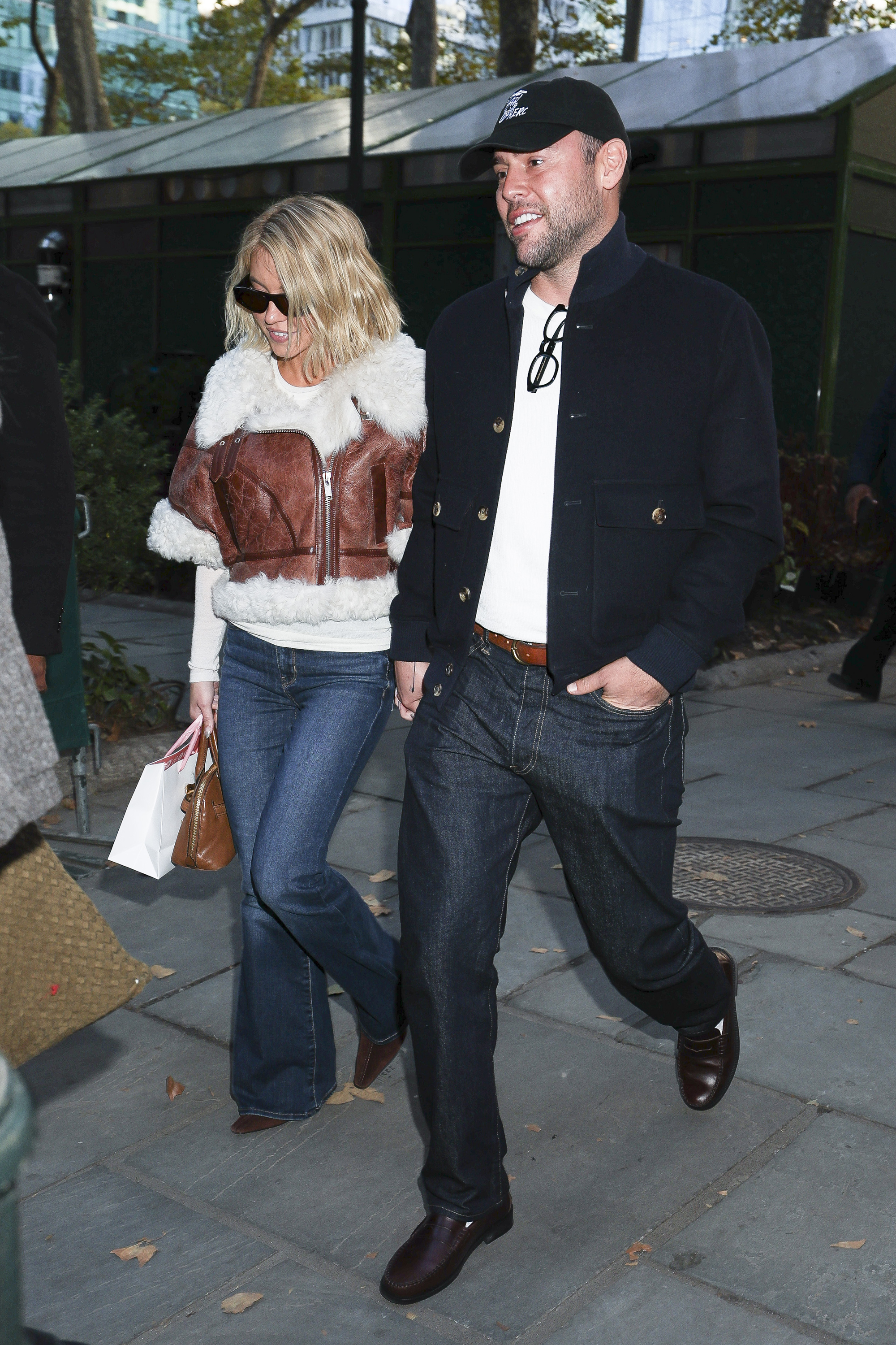 Sydney Sweeney and Scooter Braun are seen in Bryant Park on November 04, 2025 in New York City.