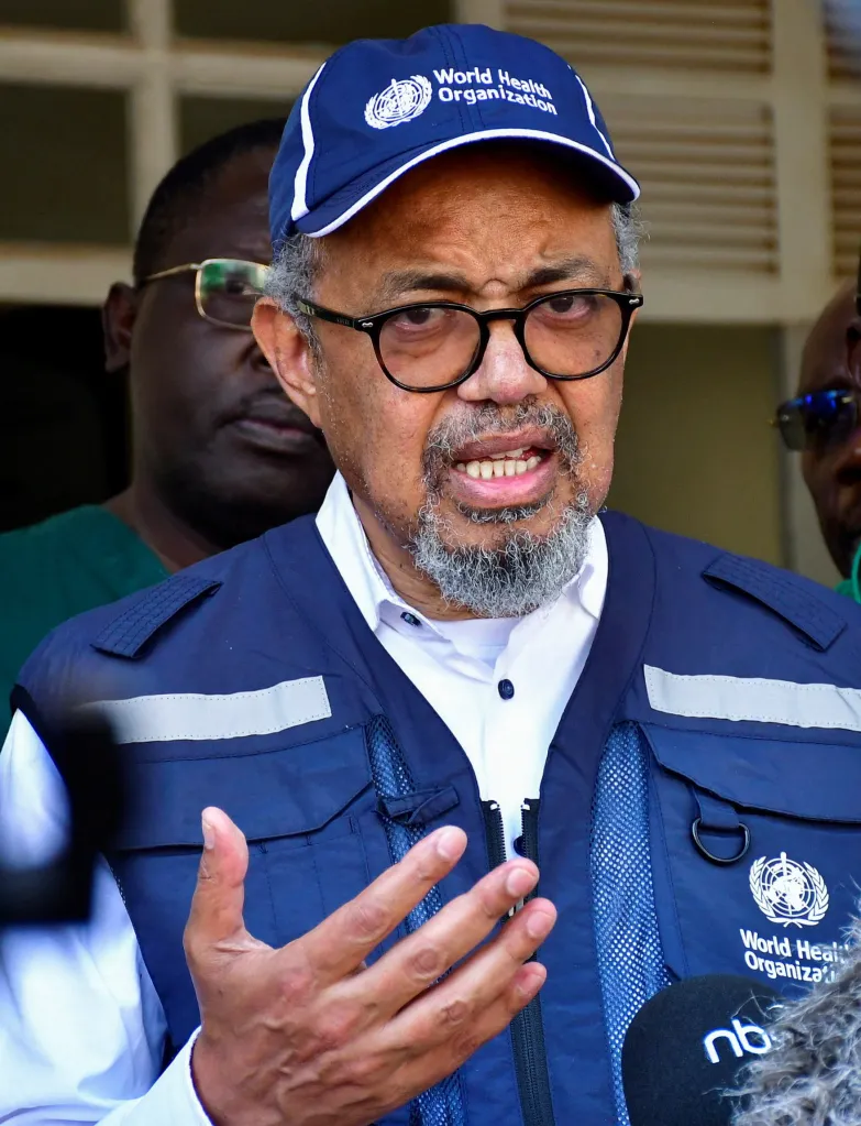 WHO Director-General Tedros Adhanom Ghebreyesus speaking to medical workers during a visit to the Mulago National Referral Hospital Isolation Unit in Kampala, Uganda.