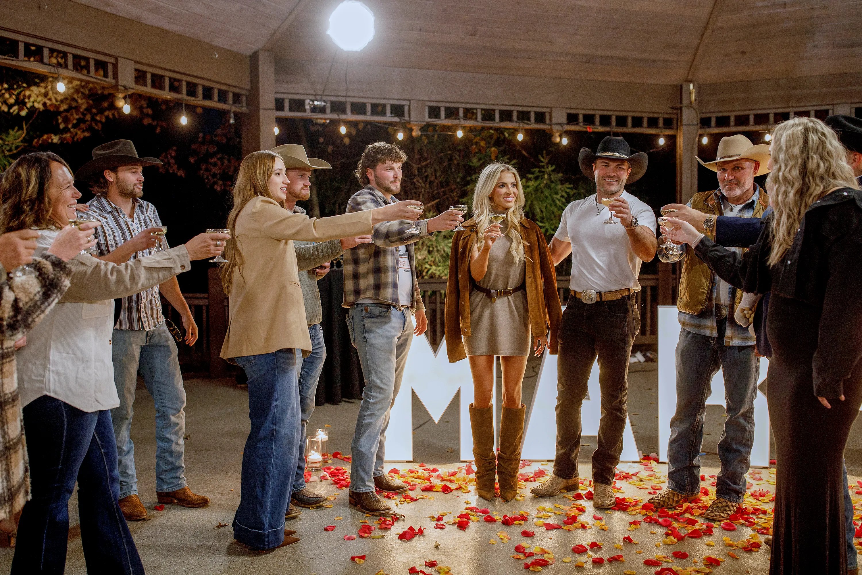 THE MCBEE DYNASTY: REAL AMERICAN COWBOYS -- Pictured: (l-r) Tessa Lollar, Jesse McBee, Masha Petrova, Jake Denton, Brayden McBee, Allie Eklund, Steven McBee Jr., Steve McBee Sr., Kacie Adkinson -- (Photo by: Paul Andrews/Bravo)
The McBee Dynasty: Real American Cowboys - Season 3