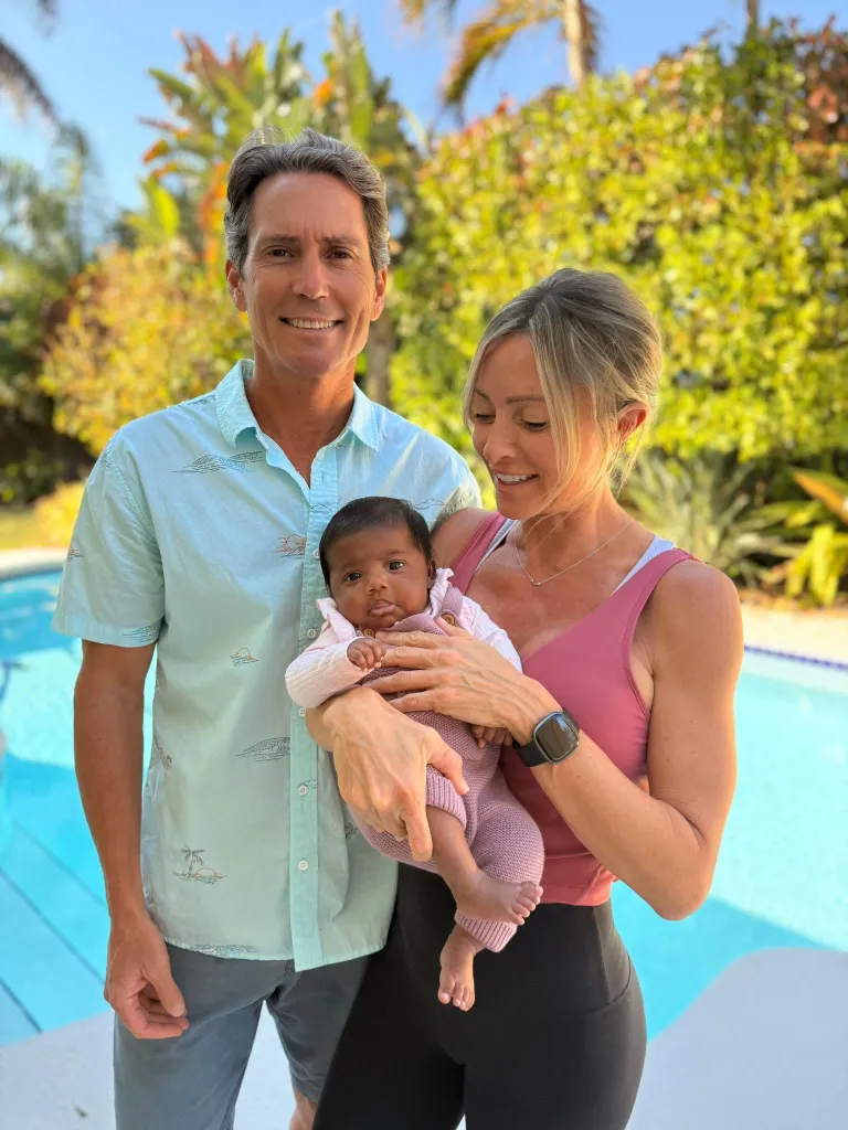 Tiffany Score and Steven Mills with six-month-old Shea.